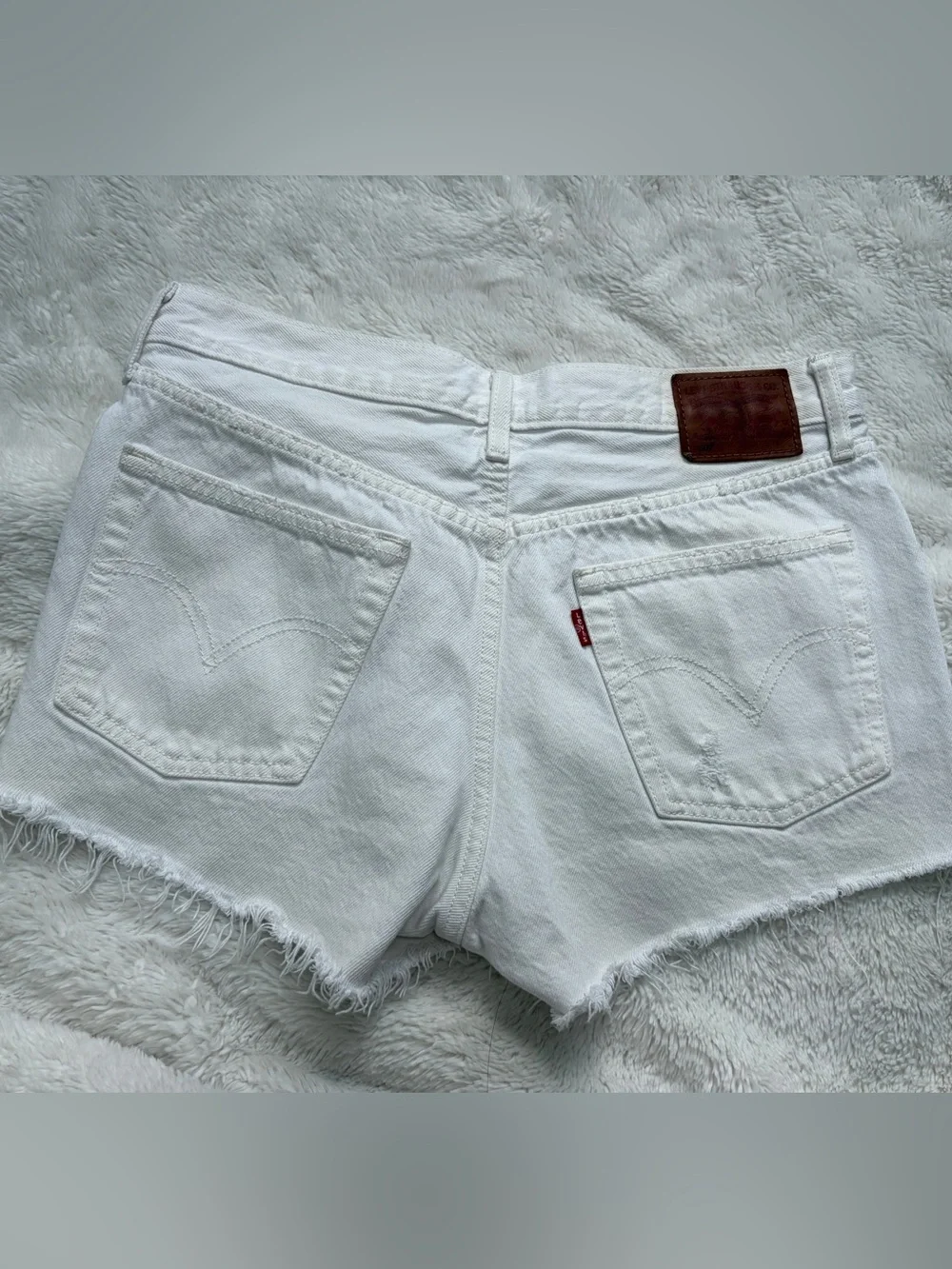 Levi's White Distressed Denim Cutoff Shorts